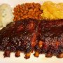 Glazed barbecue ribs serves with mac and cheese